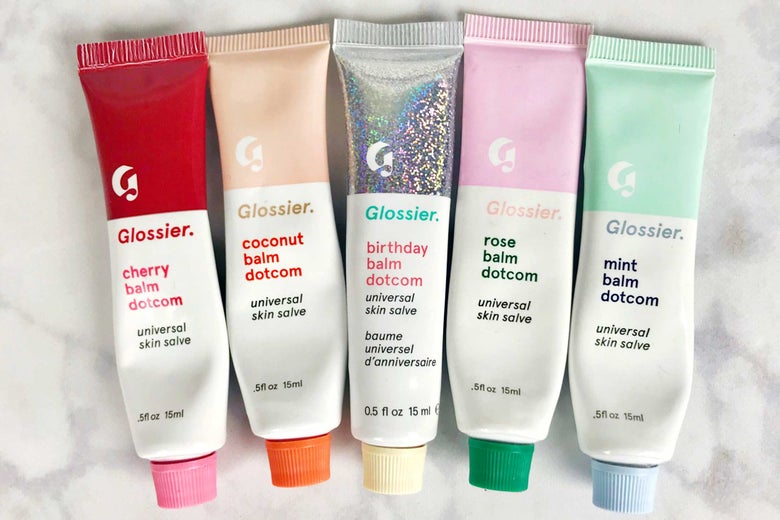 Tubes of Glossier Balm Dotcom